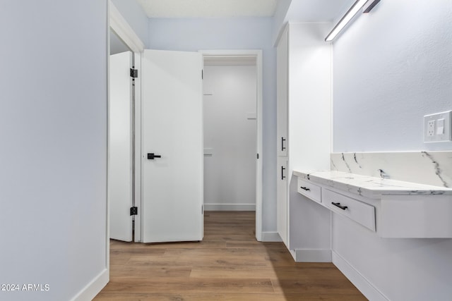 bathroom featuring vanity and hardwood / wood-style floors