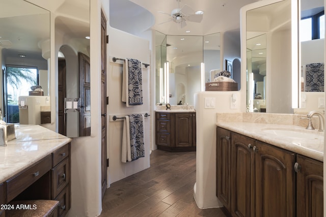 bathroom with vanity, hardwood / wood-style floors, and ceiling fan