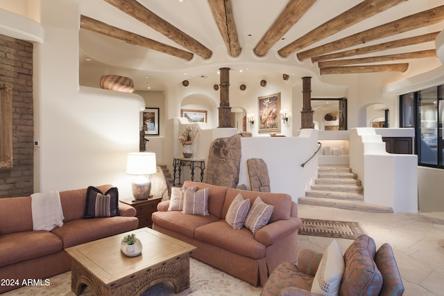 living room featuring beam ceiling