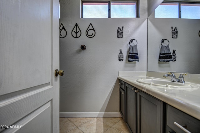 bathroom with vanity and tile patterned floors