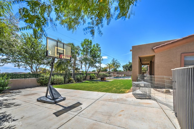 view of patio with a swimming pool