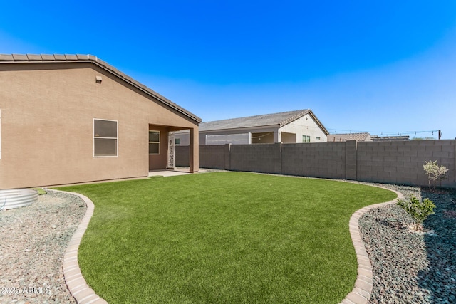 view of yard with a patio area and fence