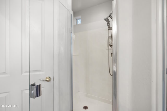 bathroom with an enclosed shower