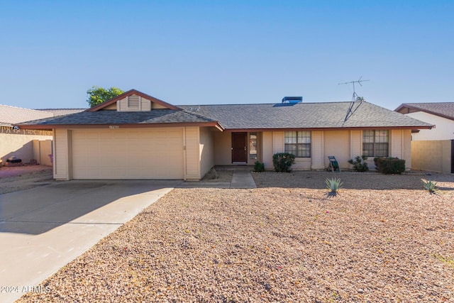 single story home with a garage