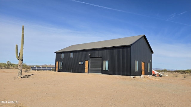 view of outbuilding with a garage