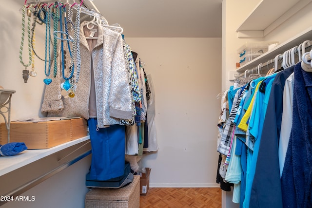 walk in closet featuring light parquet floors