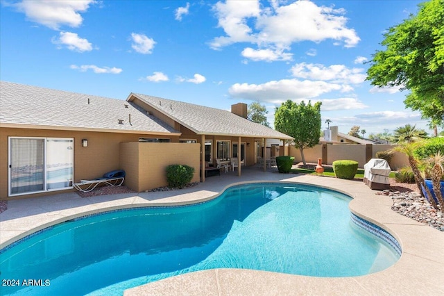 view of pool featuring a patio