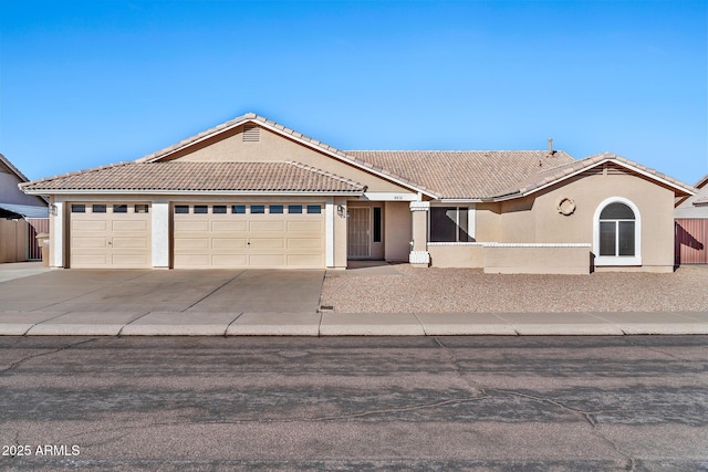 single story home featuring a garage