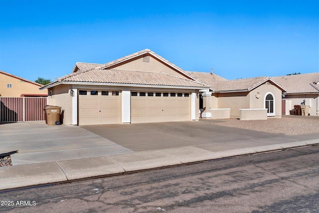 single story home with a garage