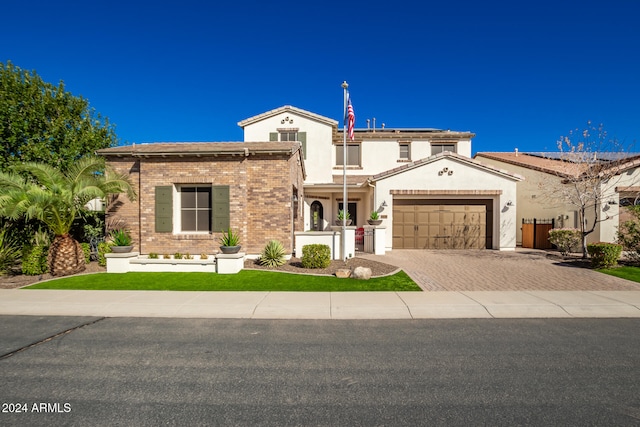 view of front of property featuring a garage