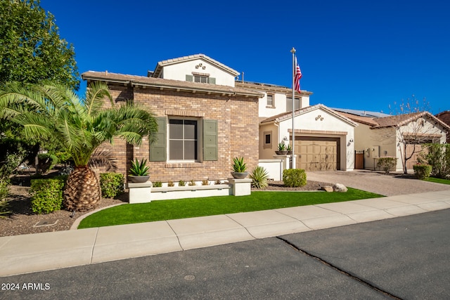 view of front of property with a garage