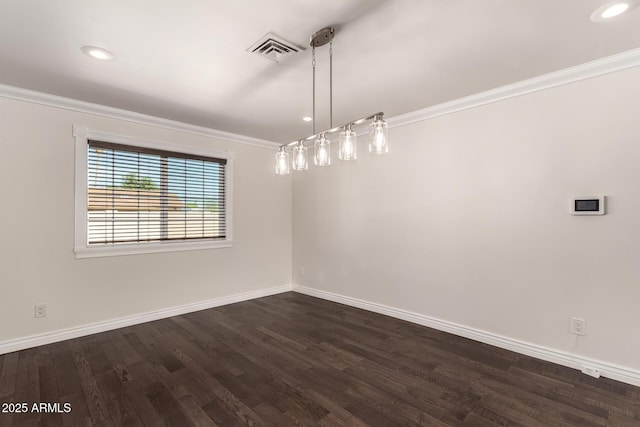 12241 N 49th Ave, Glendale, AZ 85304 - empty room featuring dark wood finished floors, crown molding, baseboards, and recessed lighting