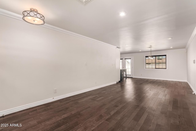 12241 N 49th Ave, Glendale, AZ 85304 - unfurnished living room featuring ornamental molding, dark wood-type flooring, baseboards, and recessed lighting