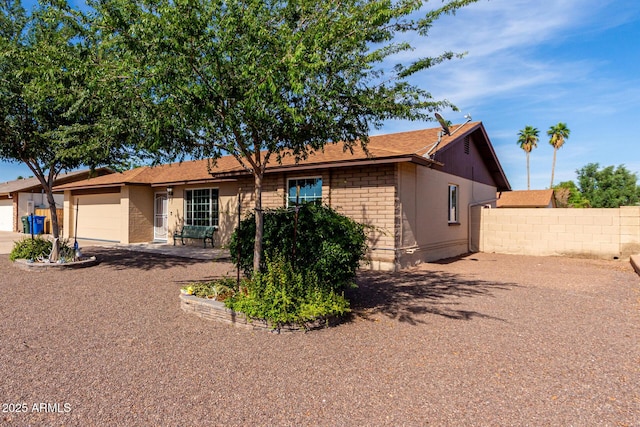 12241 N 49th Ave, Glendale, AZ 85304 - ranch-style home with an attached garage, driveway, and a shingled roof