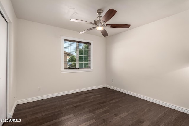12241 N 49th Ave, Glendale, AZ 85304 - unfurnished room featuring dark wood-style floors, ceiling fan, and baseboards