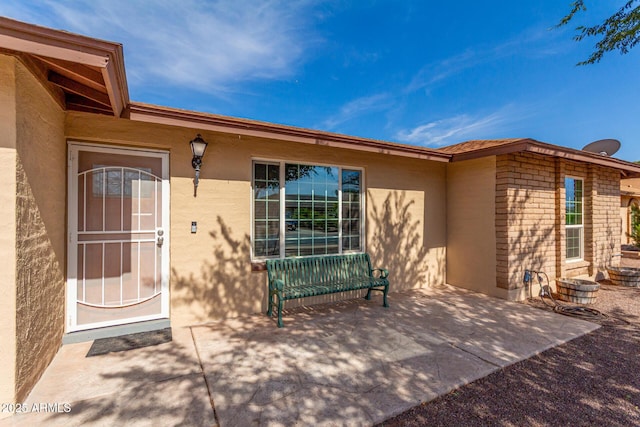 12241 N 49th Ave, Glendale, AZ 85304 - entrance to property with stucco siding and a patio