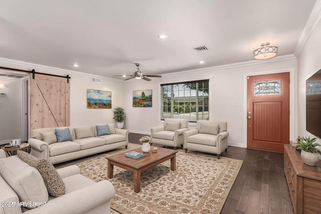 12241 N 49th Ave, Glendale, AZ 85304 - living area featuring a barn door, crown molding, ceiling fan, dark wood-style flooring, and recessed lighting