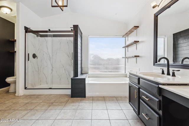 7931 W Shaw Butte Dr, Peoria, AZ 85345 - full bath featuring tile patterned flooring, vaulted ceiling, vanity, and a marble finish shower