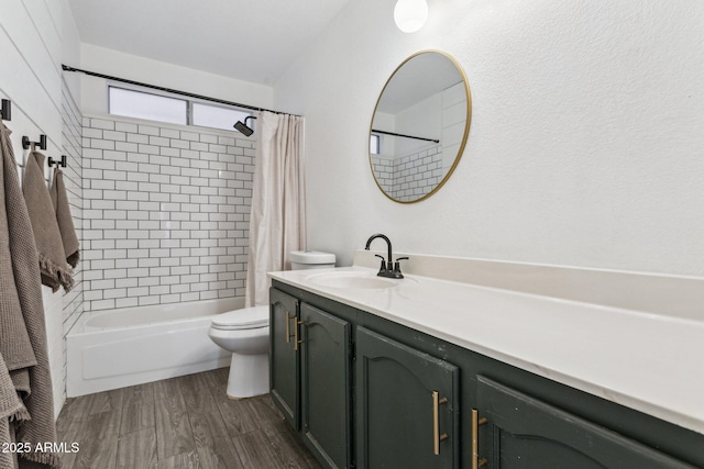 7931 W Shaw Butte Dr, Peoria, AZ 85345 - bathroom featuring wood finished floors, toilet, shower / tub combo with curtain, and vanity