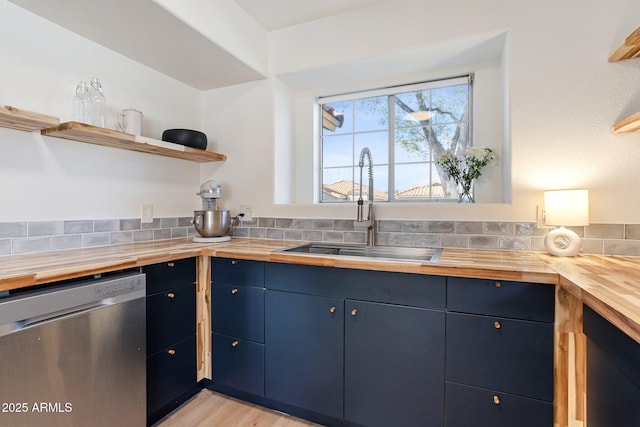 7931 W Shaw Butte Dr, Peoria, AZ 85345 - kitchen with open shelves, wood counters, blue cabinetry, stainless steel dishwasher, and a sink
