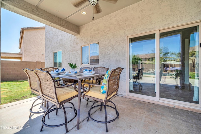 view of patio with ceiling fan