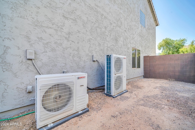 view of home's exterior with ac unit