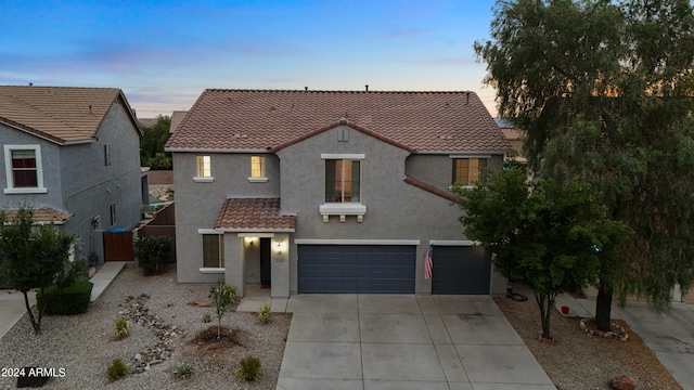 view of front of property with a garage