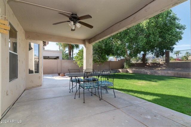 view of patio with ceiling fan