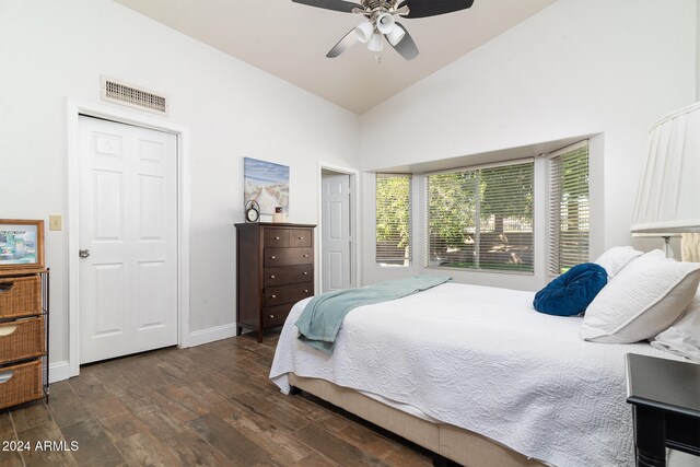 bedroom featuring high vaulted ceiling, ceiling fan, and dark hardwood / wood-style flooring