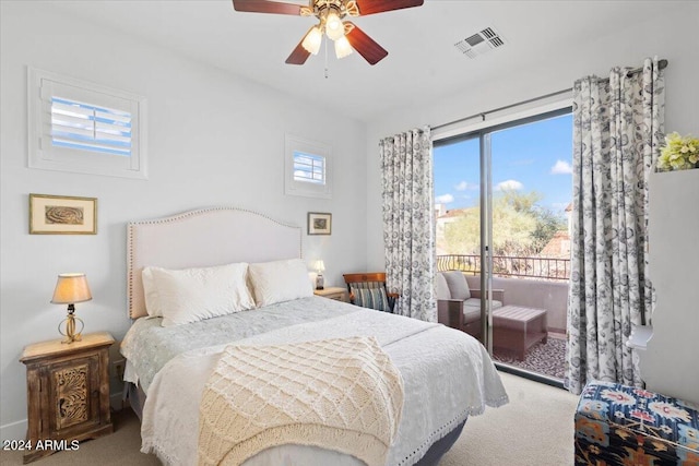 carpeted bedroom with access to exterior and ceiling fan