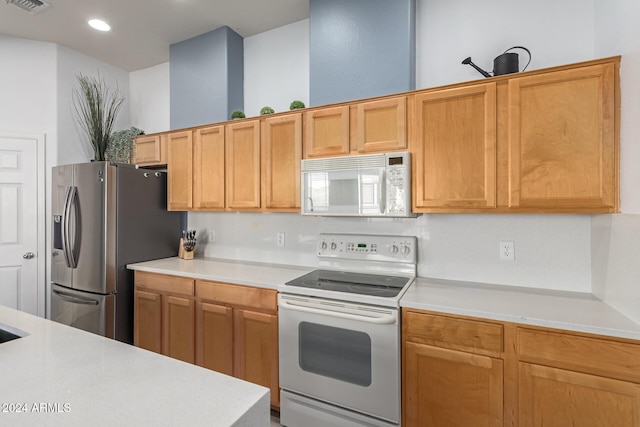 kitchen featuring white appliances