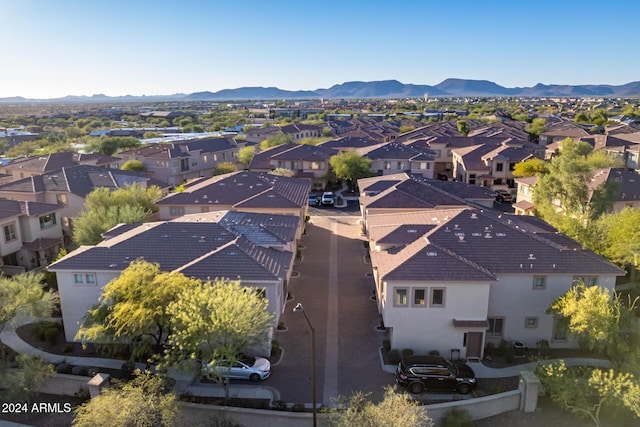 birds eye view of property featuring a mountain view