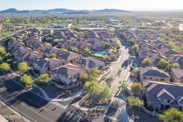 birds eye view of property featuring a mountain view