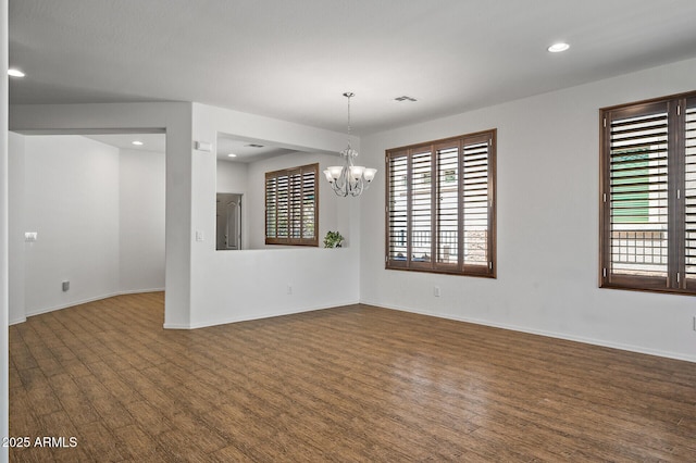 301 S 225th Ave, Buckeye, AZ 85326 - spare room with recessed lighting, a notable chandelier, and dark wood finished floors