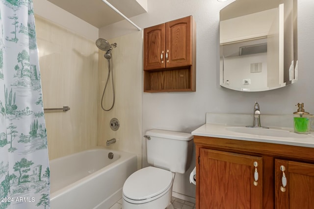 full bathroom with tile patterned flooring, shower / bath combo, toilet, and vanity