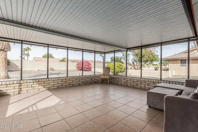 unfurnished sunroom featuring a healthy amount of sunlight