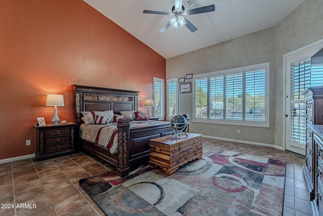 5077 E Lonesome Trl, Cave Creek, AZ 85331 - tiled bedroom with baseboards, high vaulted ceiling, a ceiling fan, access to outside, and a textured wall