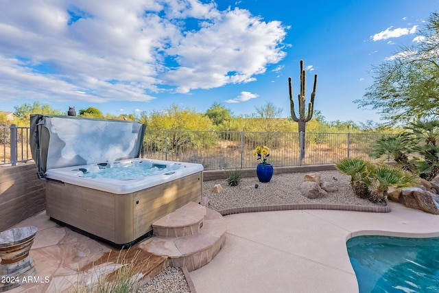 5077 E Lonesome Trl, Cave Creek, AZ 85331 - view of patio featuring a hot tub and a pool