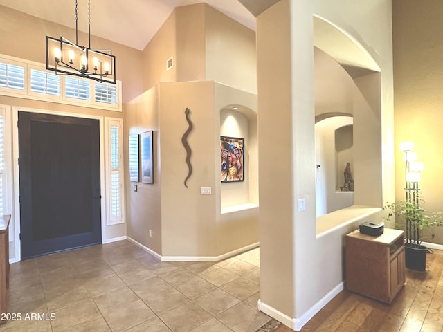 5077 E Lonesome Trl, Cave Creek, AZ 85331 - foyer featuring a high ceiling, a chandelier, and baseboards