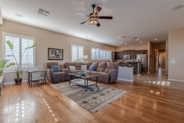5077 E Lonesome Trl, Cave Creek, AZ 85331 - living room featuring light wood-type flooring, a ceiling fan, baseboards, and recessed lighting