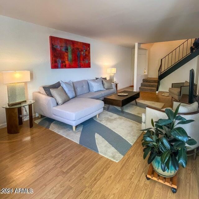 living room with wood-type flooring