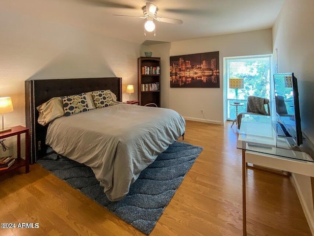 bedroom featuring ceiling fan and wood-type flooring