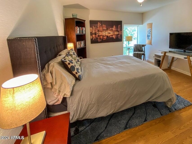 bedroom featuring wood-type flooring