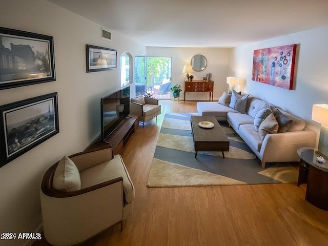 living room with hardwood / wood-style flooring