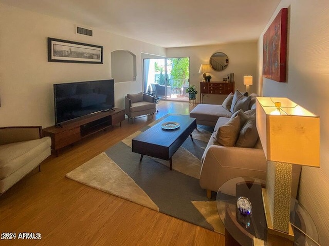 living room with hardwood / wood-style flooring