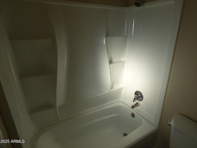 full bathroom featuring toilet and shower / tub combination