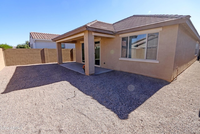 rear view of property with a patio