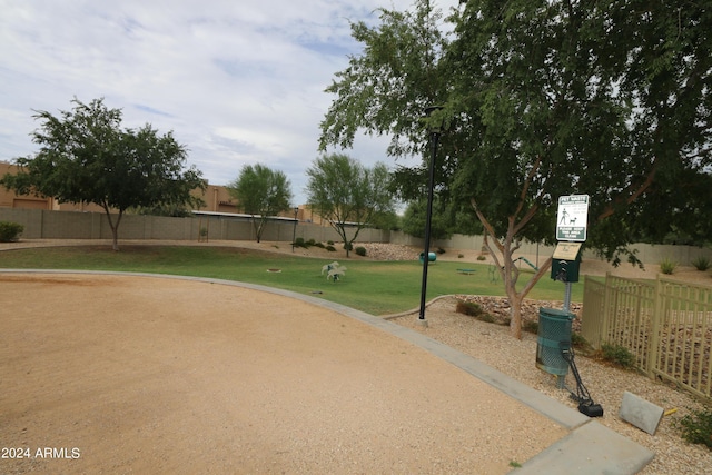 view of community featuring a yard