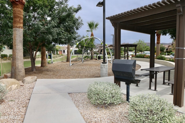 view of home's community featuring a playground