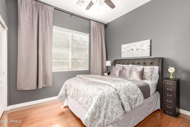 bedroom featuring ceiling fan and wood-type flooring